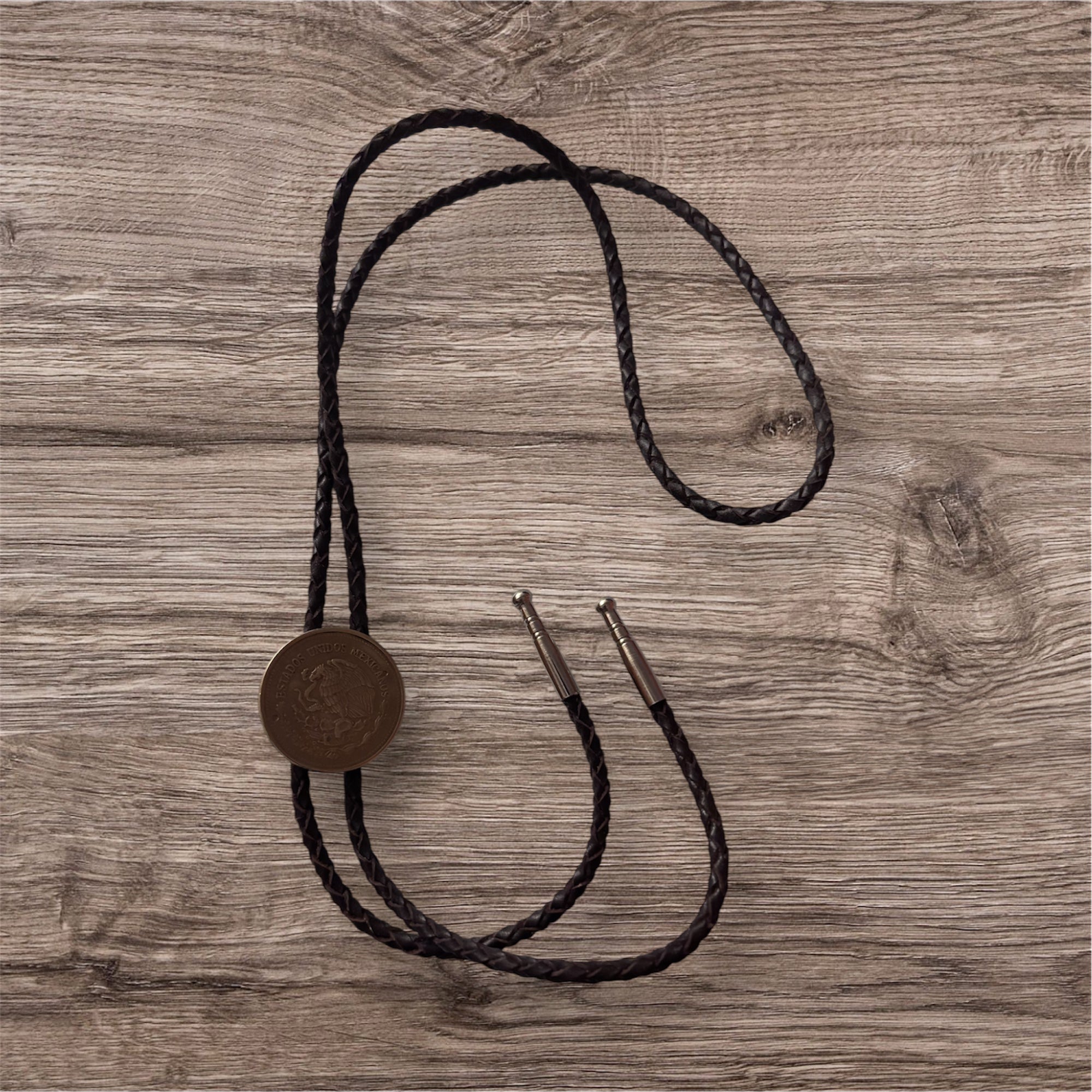 Dorienne Proulx Brown Pesos Bolo