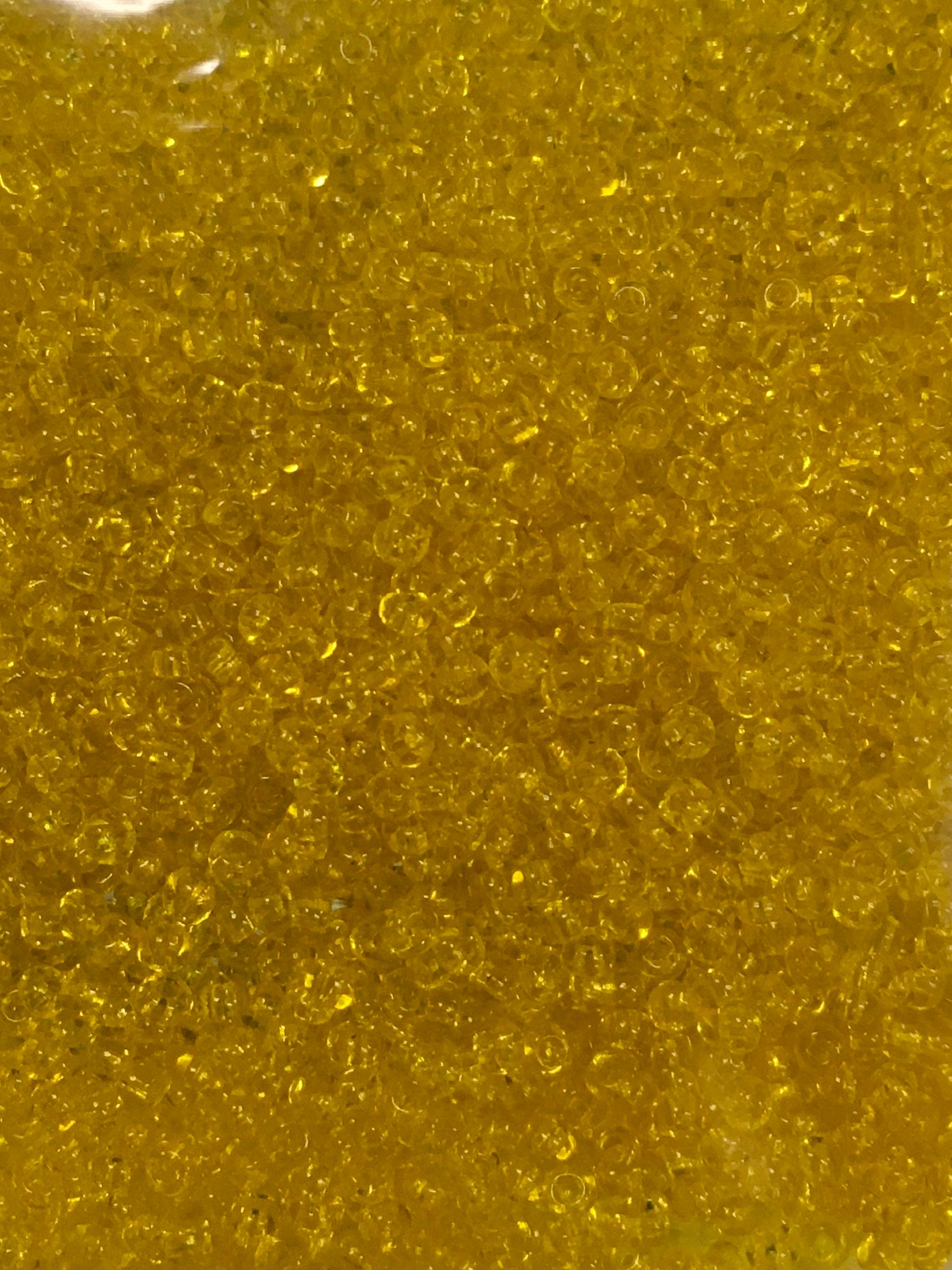 Transparent size 10/0 Light Yellow